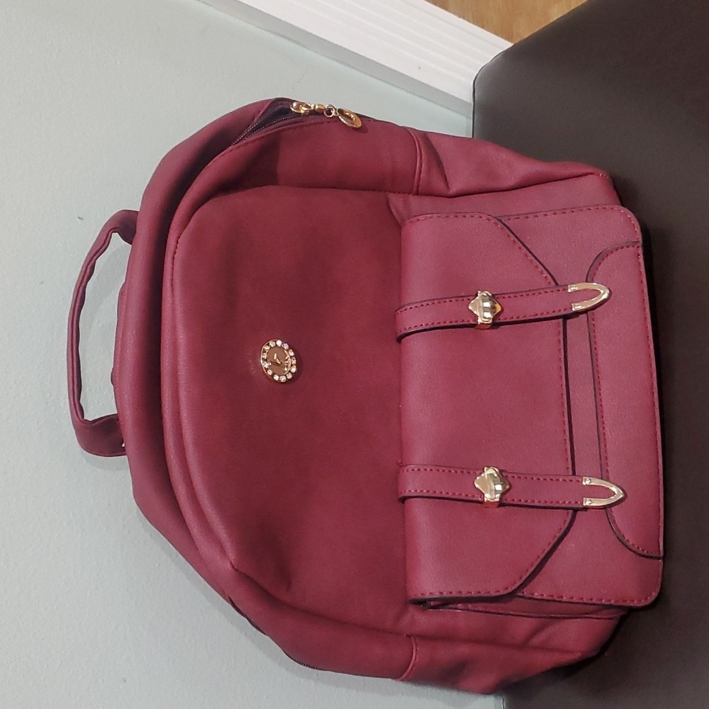 Brand new Burgundy mini backpack
